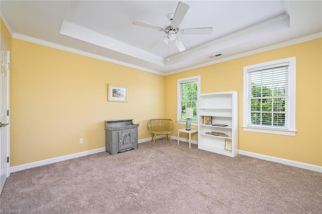183 Scottsdale Dr, Advance, NC 27006 - sitting room featuring a tray ceiling, ornamental molding, carpet flooring, ceiling fan, and baseboards