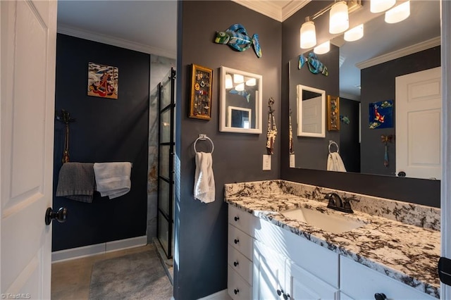 bathroom with crown molding, vanity, and a shower with door