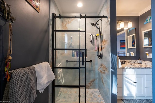 bathroom featuring ornamental molding, a shower with door, and vanity