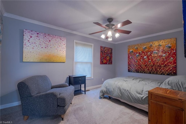 carpeted bedroom with crown molding and ceiling fan