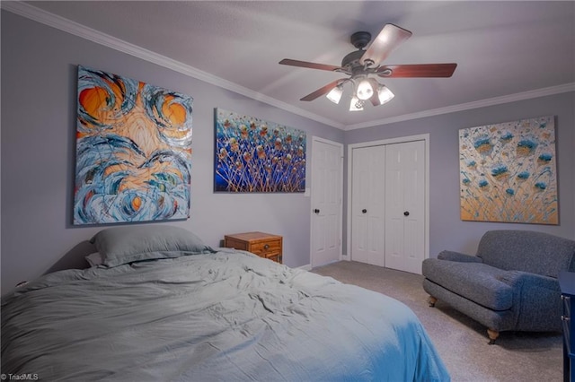 carpeted bedroom featuring crown molding, ceiling fan, and a closet