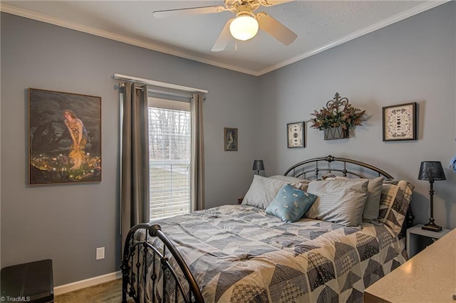 bedroom with ornamental molding, carpet floors, baseboards, and a ceiling fan