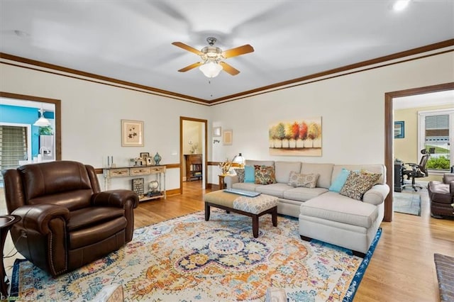 4802 Worchester Pl, Jamestown, NC 27282 - living room featuring ceiling fan, wood finished floors, ornamental molding, and baseboards