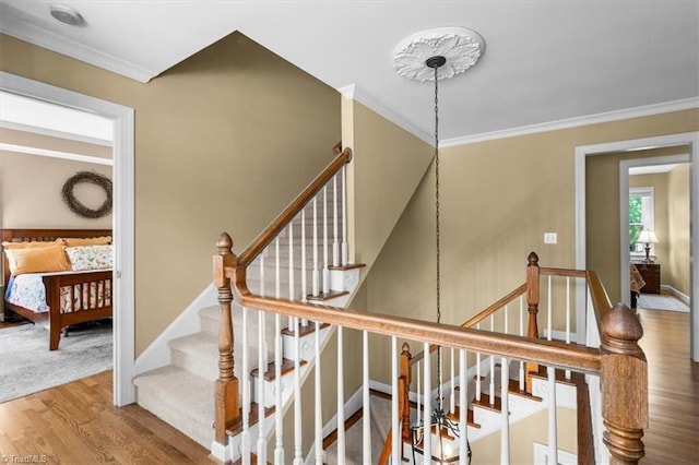 4802 Worchester Pl, Jamestown, NC 27282 - stairway featuring wood finished floors, ornamental molding, and baseboards