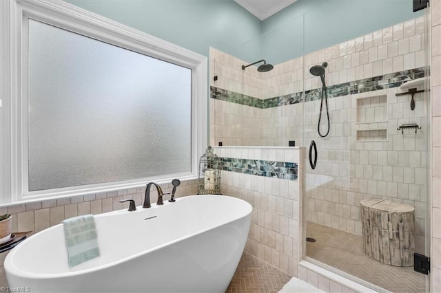 4802 Worchester Pl, Jamestown, NC 27282 - full bathroom featuring a tile shower, a freestanding tub, and tile walls