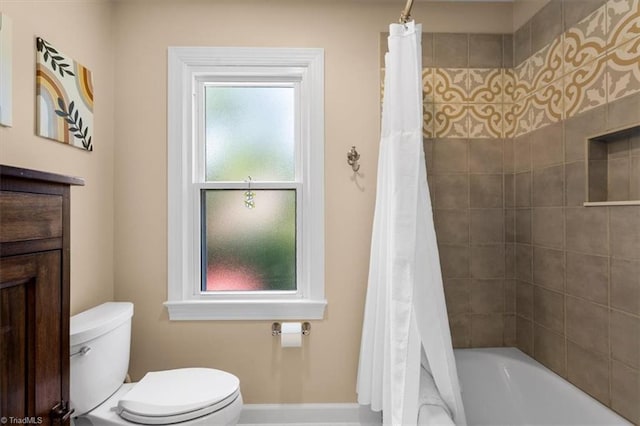 4802 Worchester Pl, Jamestown, NC 27282 - full bathroom featuring healthy amount of natural light, toilet, baseboards, and shower / bath combo