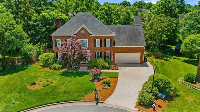 4802 Worchester Pl, Jamestown, NC 27282 - georgian-style home with driveway, a chimney, and an attached garage