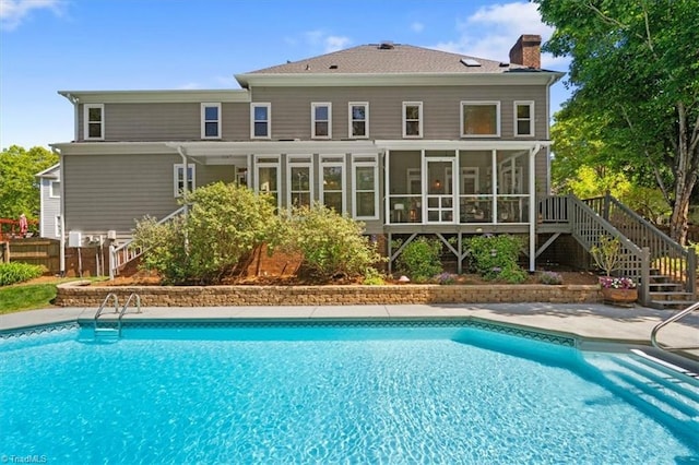 4802 Worchester Pl, Jamestown, NC 27282 - swimming pool with a sunroom, stairway, and fence