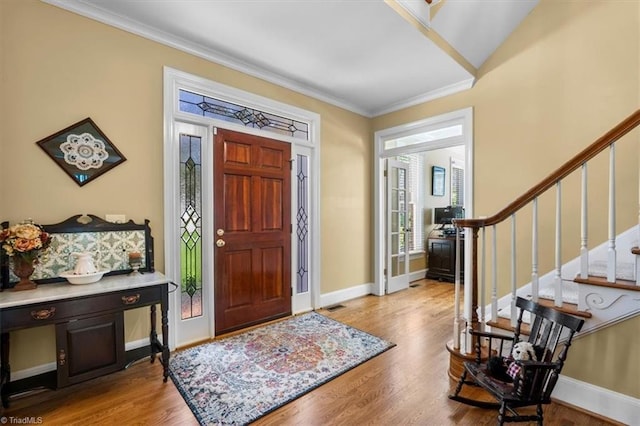4802 Worchester Pl, Jamestown, NC 27282 - foyer with stairway, ornamental molding, light wood-type flooring, and baseboards