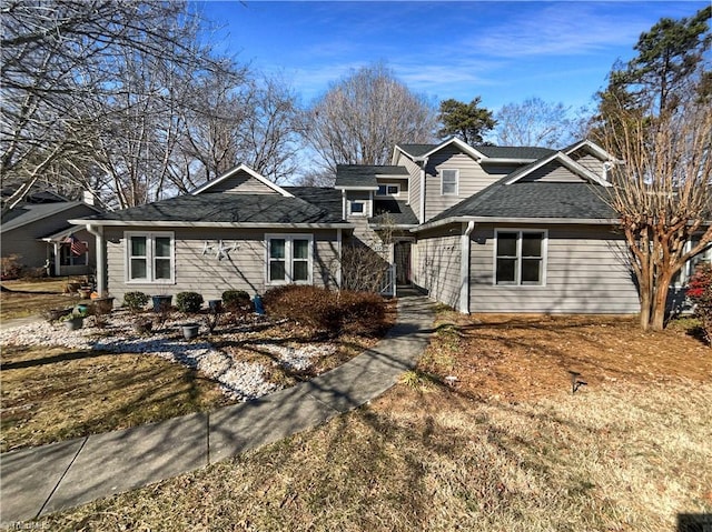 view of front of house featuring a shingled roof