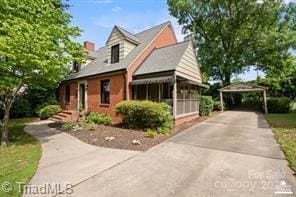 720 Ferndale Blvd, High Point, NC 27262 - view of front of home with driveway and a carport