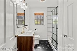 720 Ferndale Blvd, High Point, NC 27262 - full bath with vanity, toilet, and tile patterned flooring
