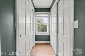 720 Ferndale Blvd, High Point, NC 27262 - corridor with light wood-type flooring and baseboards
