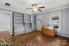 720 Ferndale Blvd, High Point, NC 27262 - office featuring ornamental molding, a decorative wall, and a ceiling fan