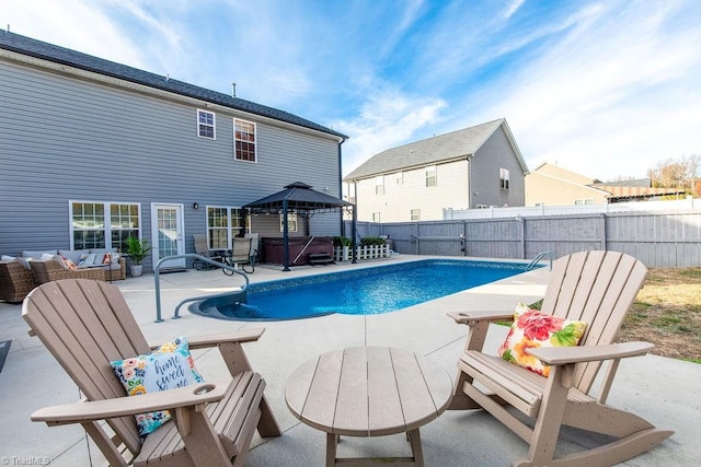 view of pool with a gazebo, an outdoor hangout area, a patio, and a hot tub