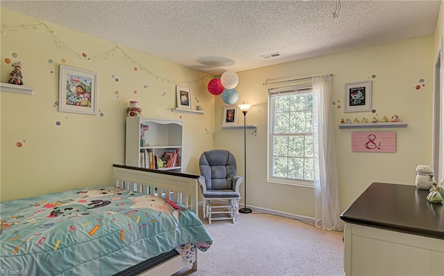 bedroom with visible vents, baseboards, light colored carpet, and a textured ceiling