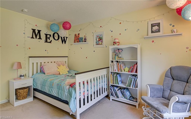 carpeted bedroom with a textured ceiling