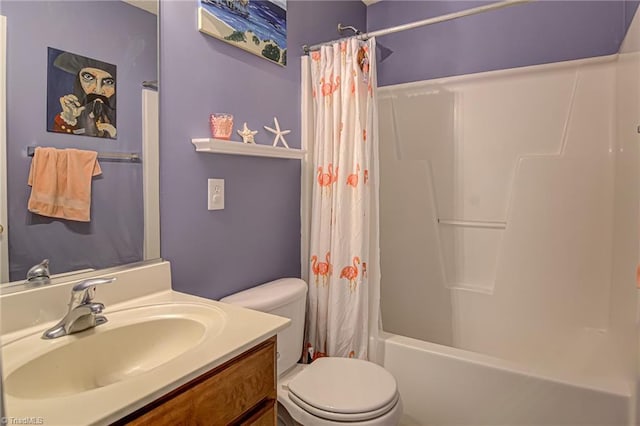 full bath with shower / tub combo with curtain, toilet, and vanity