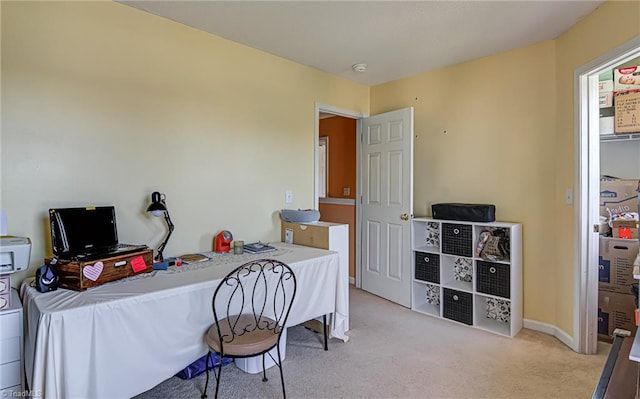 office area with light colored carpet