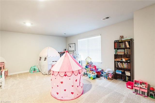 game room featuring light colored carpet