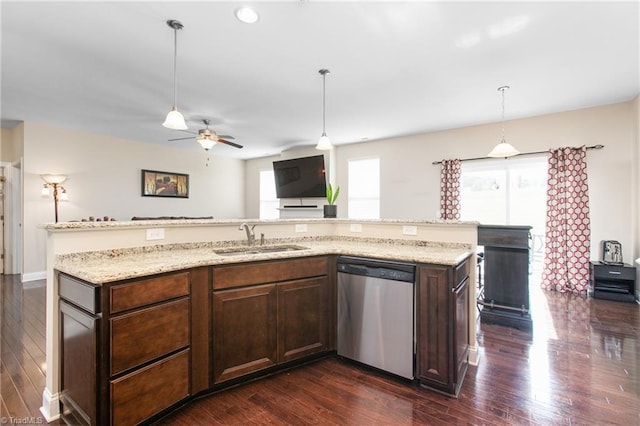 kitchen with dark wood-style floors, ceiling fan, a sink, and dishwasher