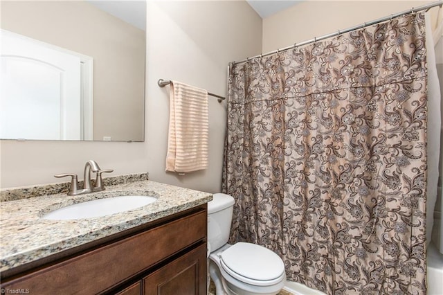 full bath with toilet and vanity