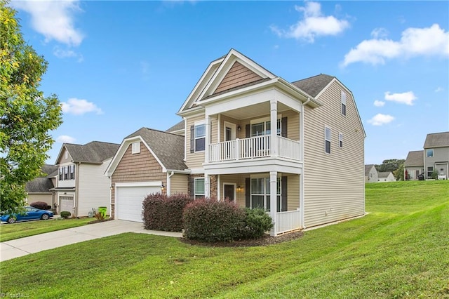 traditional-style home featuring a balcony, a front yard, a garage, and driveway