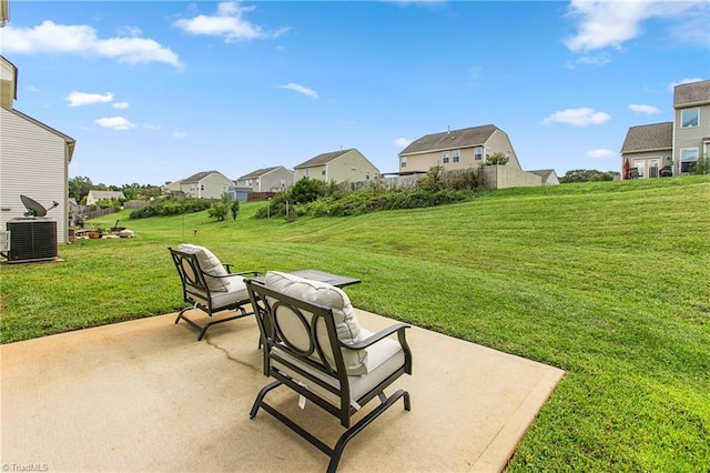 view of patio / terrace featuring central AC unit and a residential view