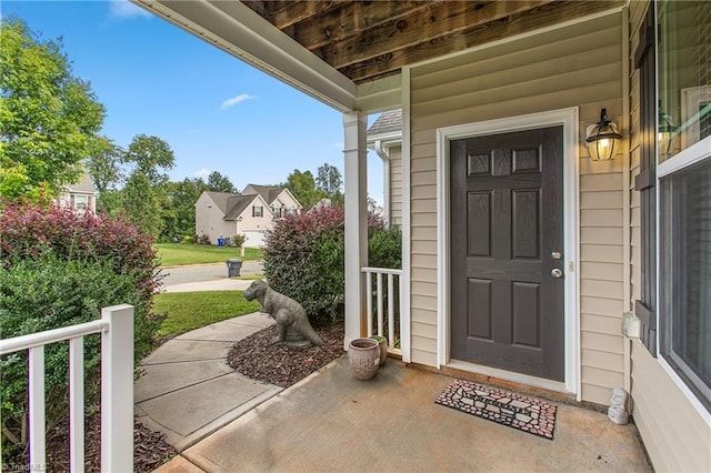 property entrance featuring covered porch