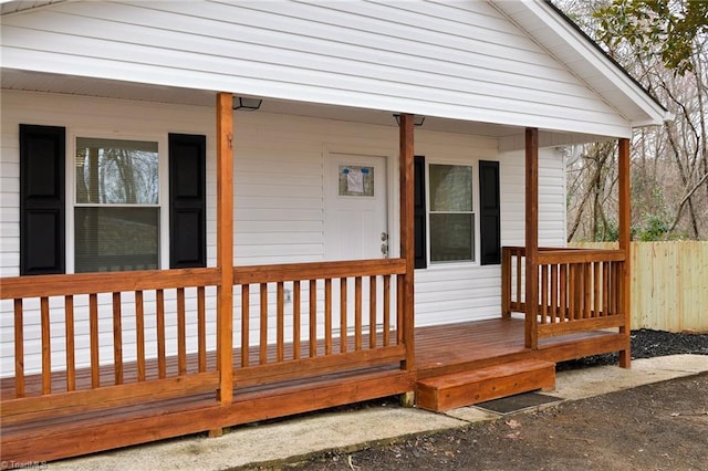 entrance to property featuring a porch