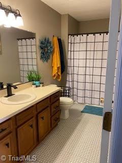 102 Aspen Ct, Winston-Salem, NC 27106 - bathroom featuring vanity and a shower with shower curtain
