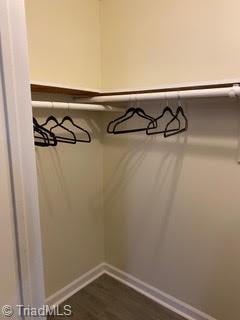 102 Aspen Ct, Winston-Salem, NC 27106 - spacious closet with dark wood-style floors