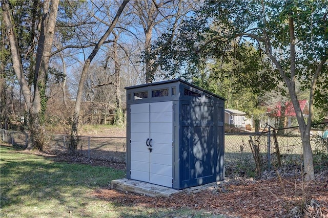 view of outdoor structure featuring a yard