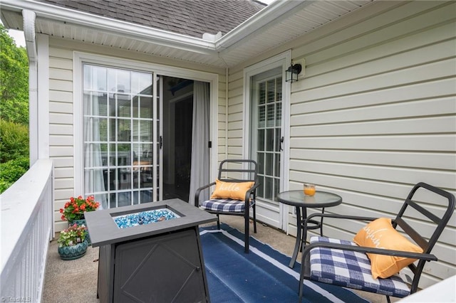 view of patio with an outdoor fire pit