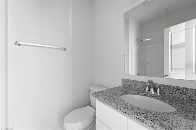 2154 E First St, Winston-Salem, NC 27101 - full bathroom with vanity, toilet, and a shower