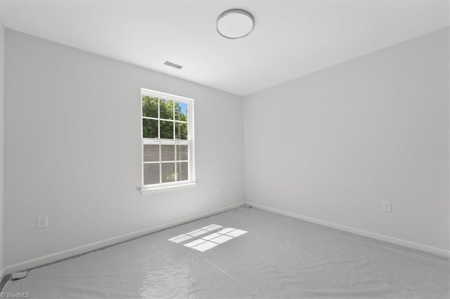 2154 E First St, Winston-Salem, NC 27101 - spare room featuring baseboards