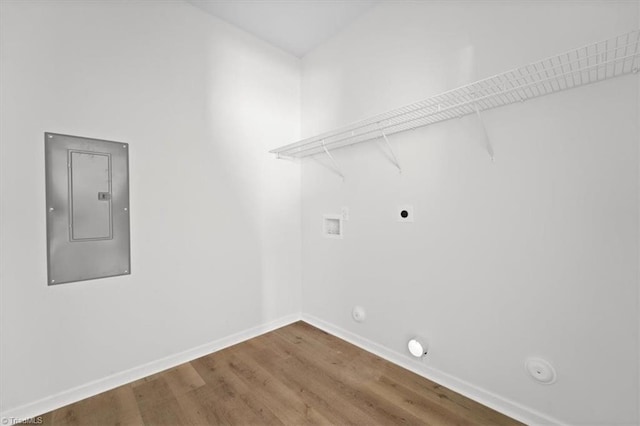 2154 E First St, Winston-Salem, NC 27101 - washroom featuring hookup for a gas dryer, electric panel, electric dryer hookup, washer hookup, and wood finished floors