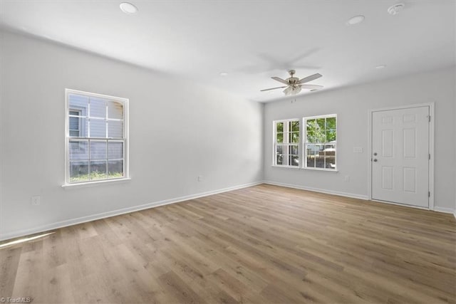 2154 E First St, Winston-Salem, NC 27101 - spare room featuring ceiling fan, wood finished floors, baseboards, and recessed lighting