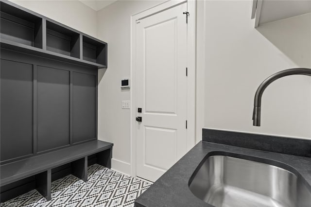 mudroom featuring a sink