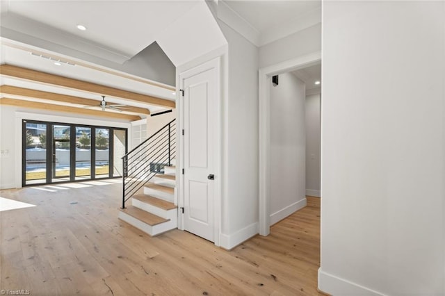 staircase with recessed lighting, ceiling fan, baseboards, and wood-type flooring