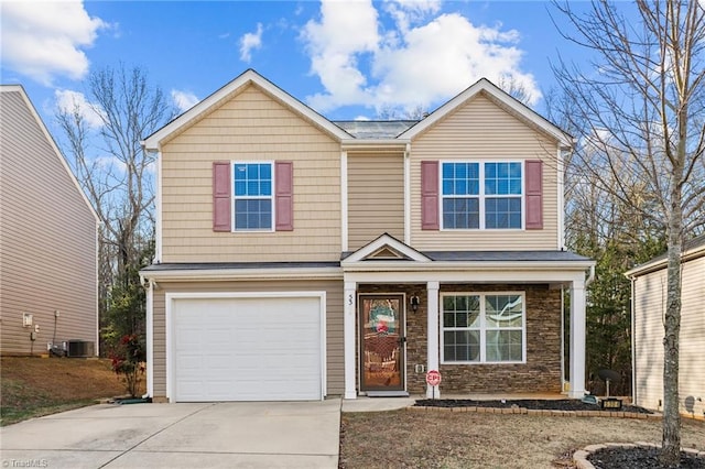 view of front of home with a garage