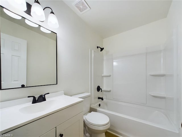 bathroom featuring visible vents, toilet, vanity, and shower / bathtub combination