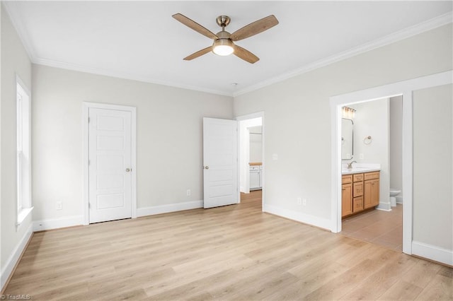 unfurnished bedroom with connected bathroom, ornamental molding, light hardwood / wood-style floors, and sink