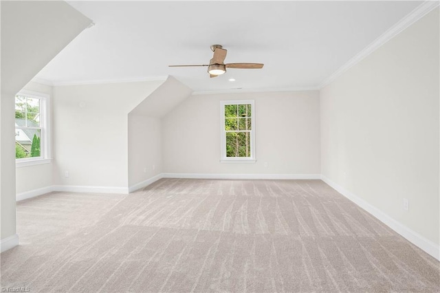 bonus room featuring light carpet and ceiling fan