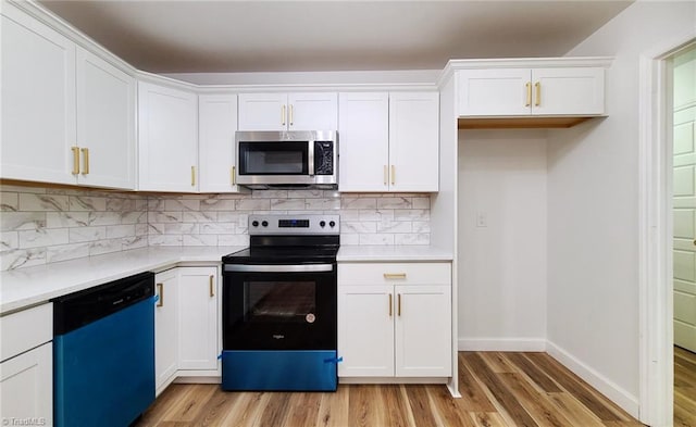 1628 Eagle Crest Dr, Pfafftown, NC 27040 - kitchen with dishwashing machine, stainless steel microwave, electric range oven, and light wood finished floors