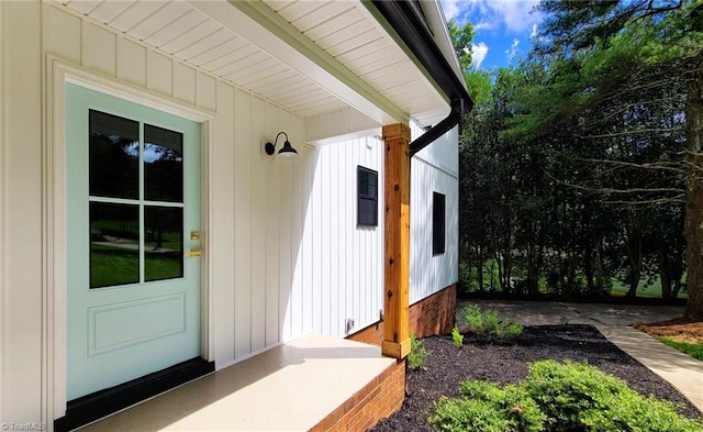 1628 Eagle Crest Dr, Pfafftown, NC 27040 - view of exterior entry with board and batten siding