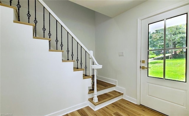 1628 Eagle Crest Dr, Pfafftown, NC 27040 - entryway featuring healthy amount of natural light, light wood finished floors, and stairway