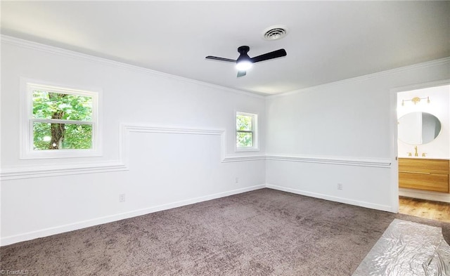 1628 Eagle Crest Dr, Pfafftown, NC 27040 - unfurnished bedroom with carpet floors, crown molding, ensuite bath, and ceiling fan