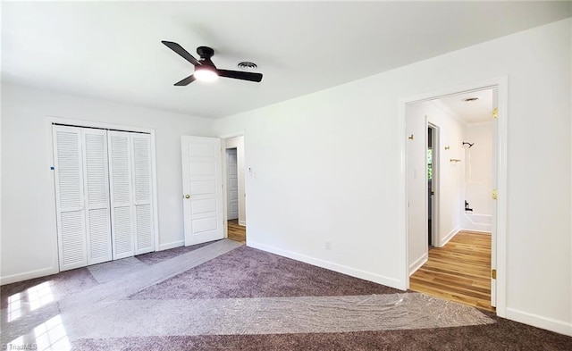 1628 Eagle Crest Dr, Pfafftown, NC 27040 - unfurnished bedroom with carpet, a closet, and ceiling fan