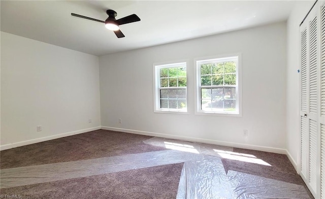 1628 Eagle Crest Dr, Pfafftown, NC 27040 - unfurnished bedroom with carpet, a closet, and a ceiling fan